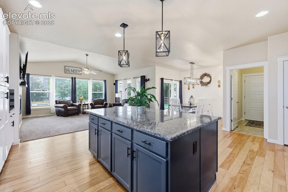 kitchen flows effortlessly into the dining and living areas