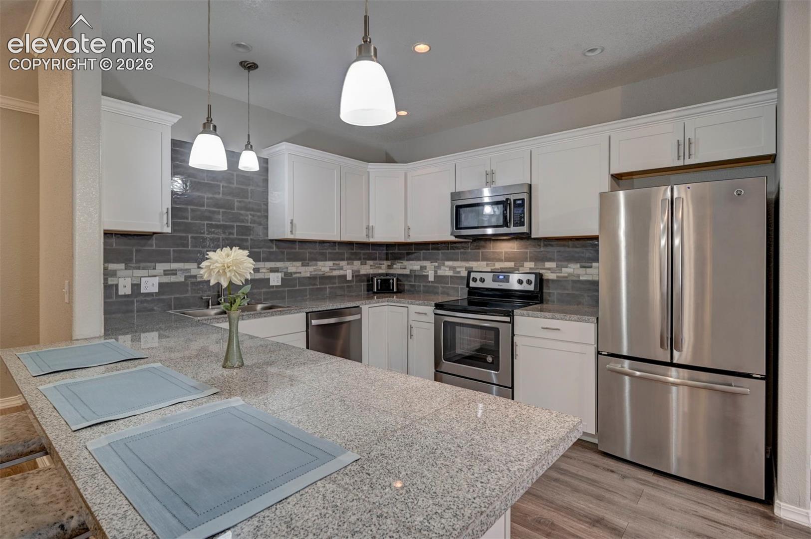 Custom Backsplash/ SS appliances