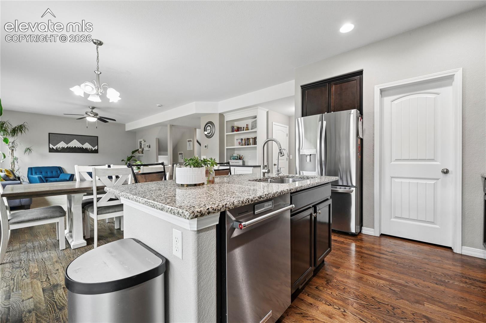 The open floor plan maximizes every square foot of a home that is already a generous size.  And the warm wood tones make this home stand out from the plethora of monochromatic homes on the market right now.