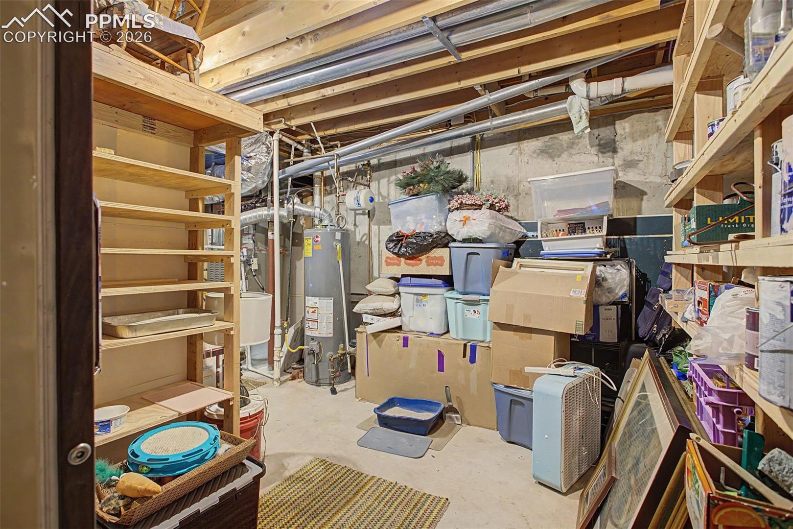 Basement storage area/furnace room.