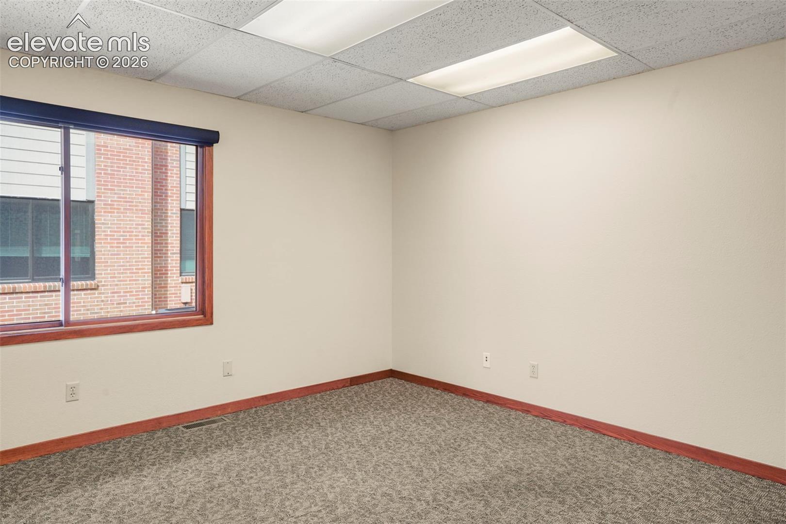 West Side office #3- another sample office space. All offices have roller shades.