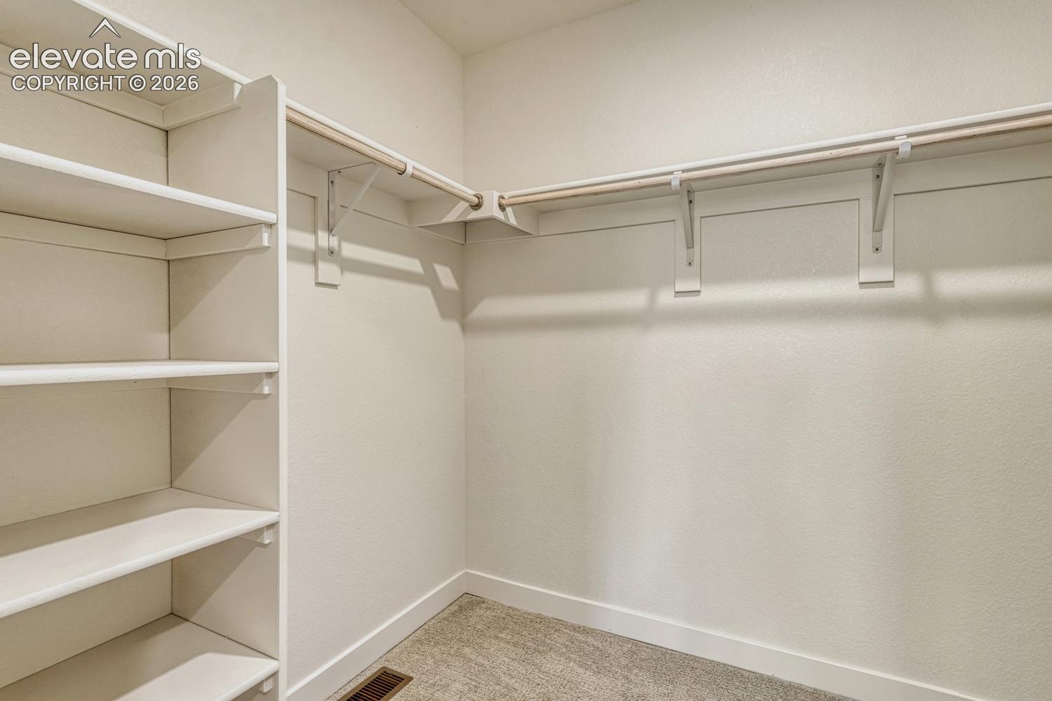 Large walk-in closet is through the primary bathroom