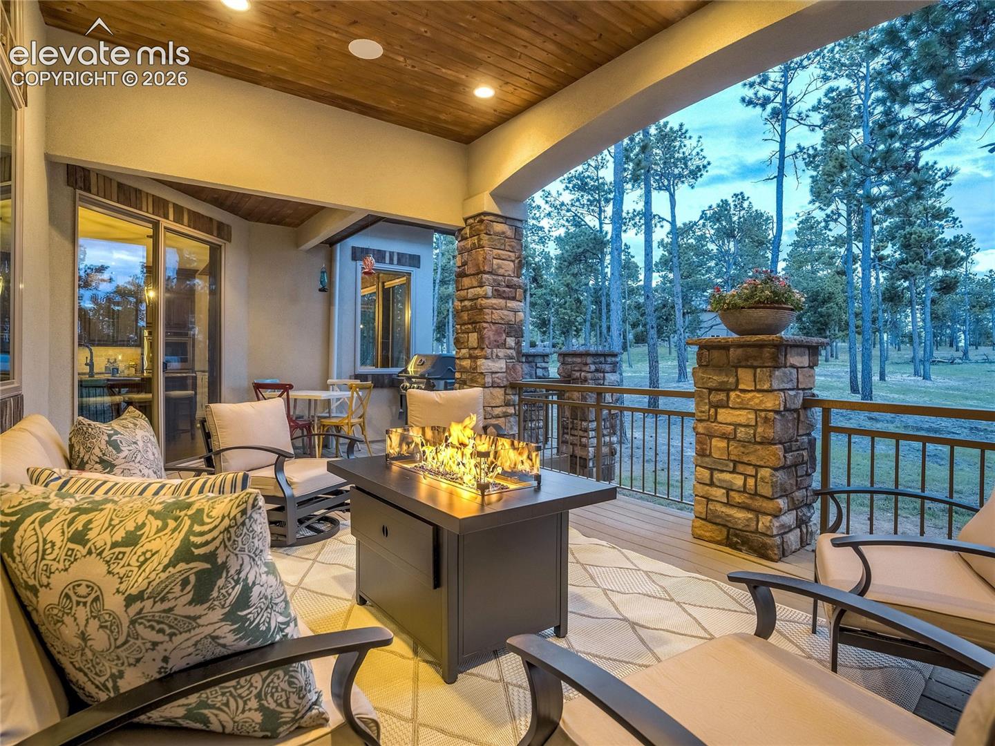 The covered deck captures a sense of serenity among the whispering pines creating a feeling of absolute serenity - an invitation to slow down, unwind, and exhale.