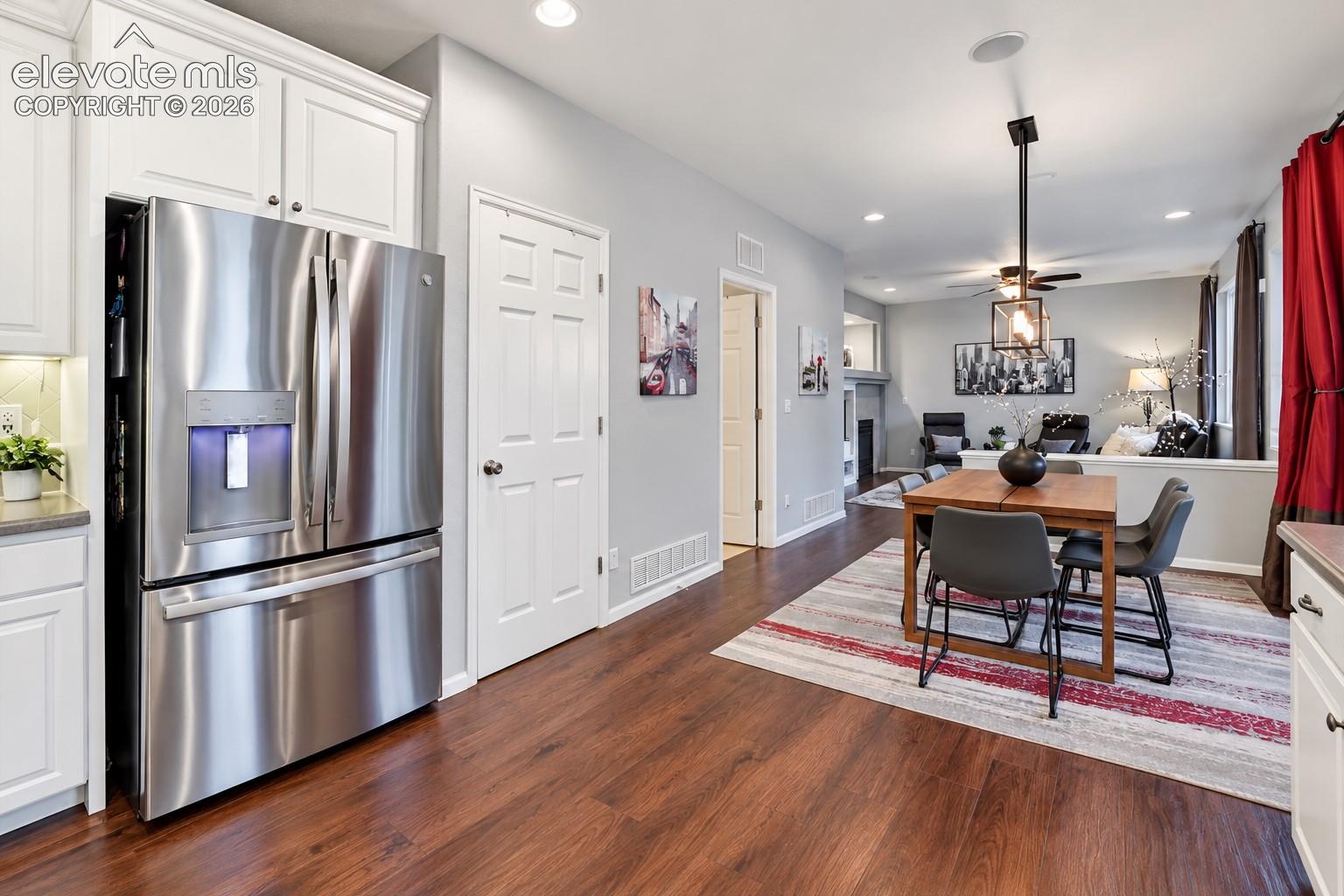 An open connection between kitchen, dining and living areas keeps everyone part of the conversation.