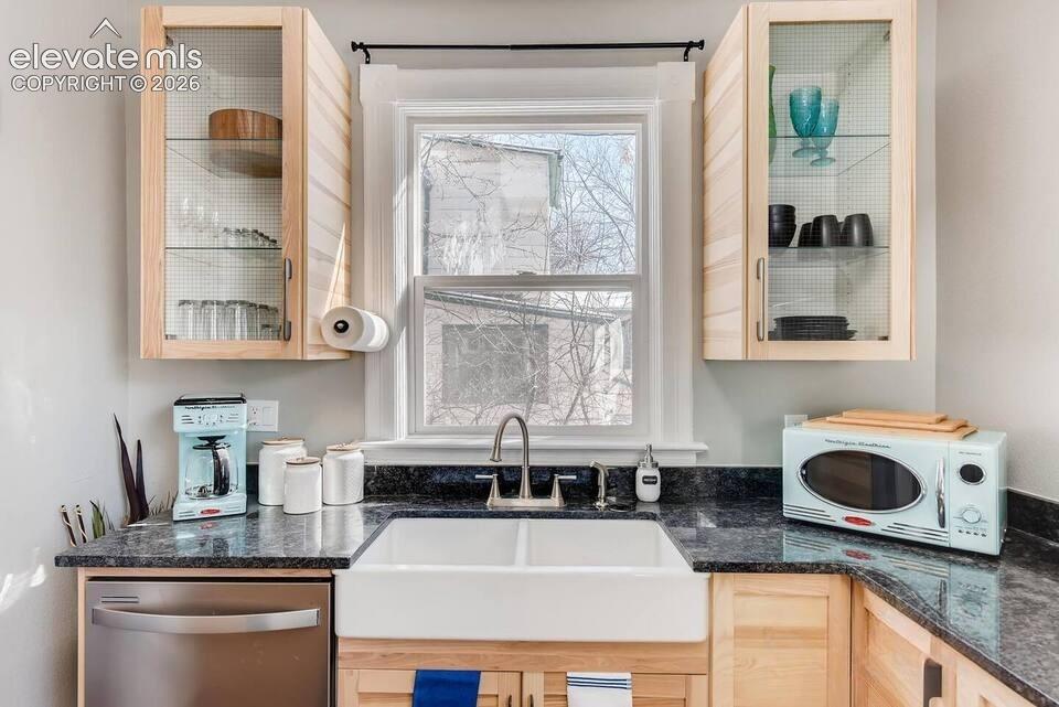 Modern cabinetry is the perfect accent against the old-world charm and architecture of this home.