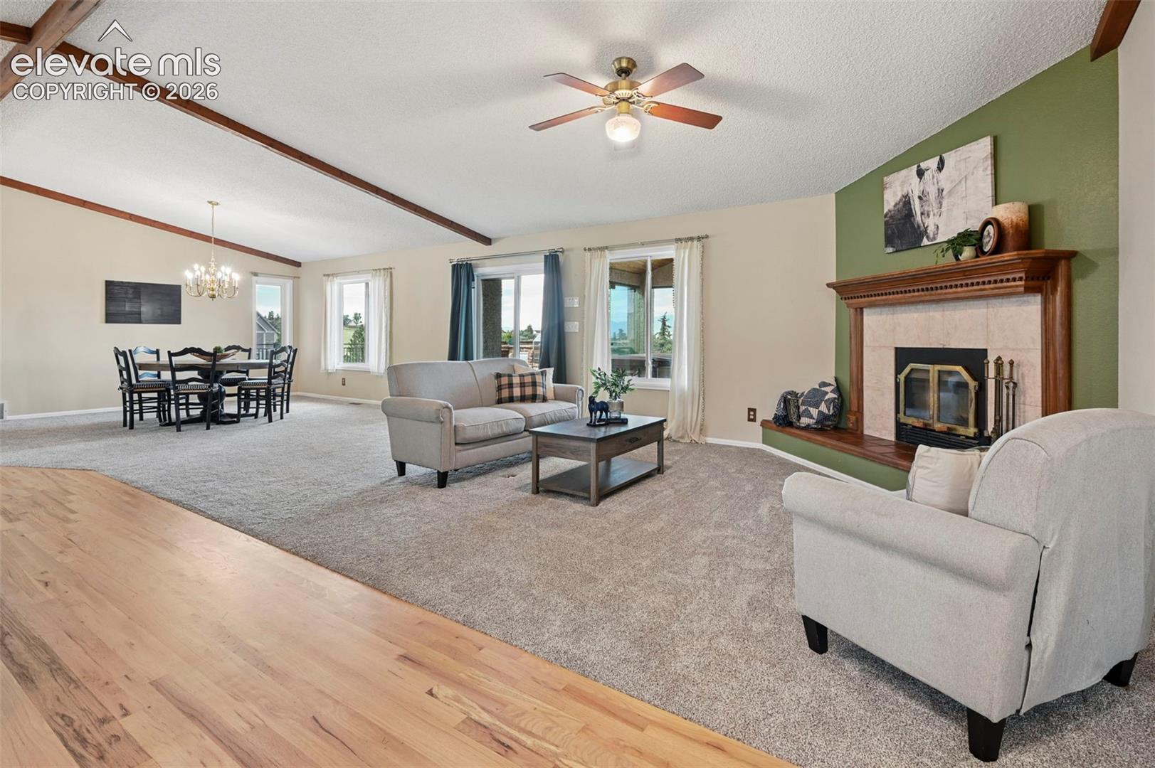 Spacious Living area with wood burning fireplace