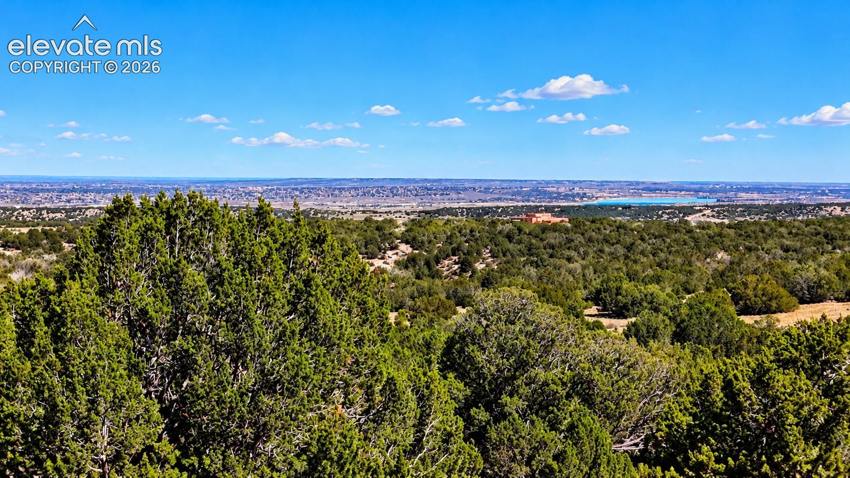 Enjoy beautiful views toward Pueblo Reservoir from elevated vantage points, surrounded by mature juniper trees and the natural beauty of Red Creek Ranch.


