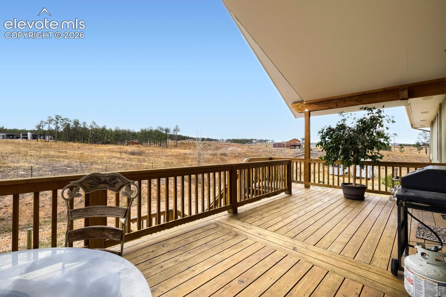 The covered back deck offers more private dining and entertainment opportunities. 