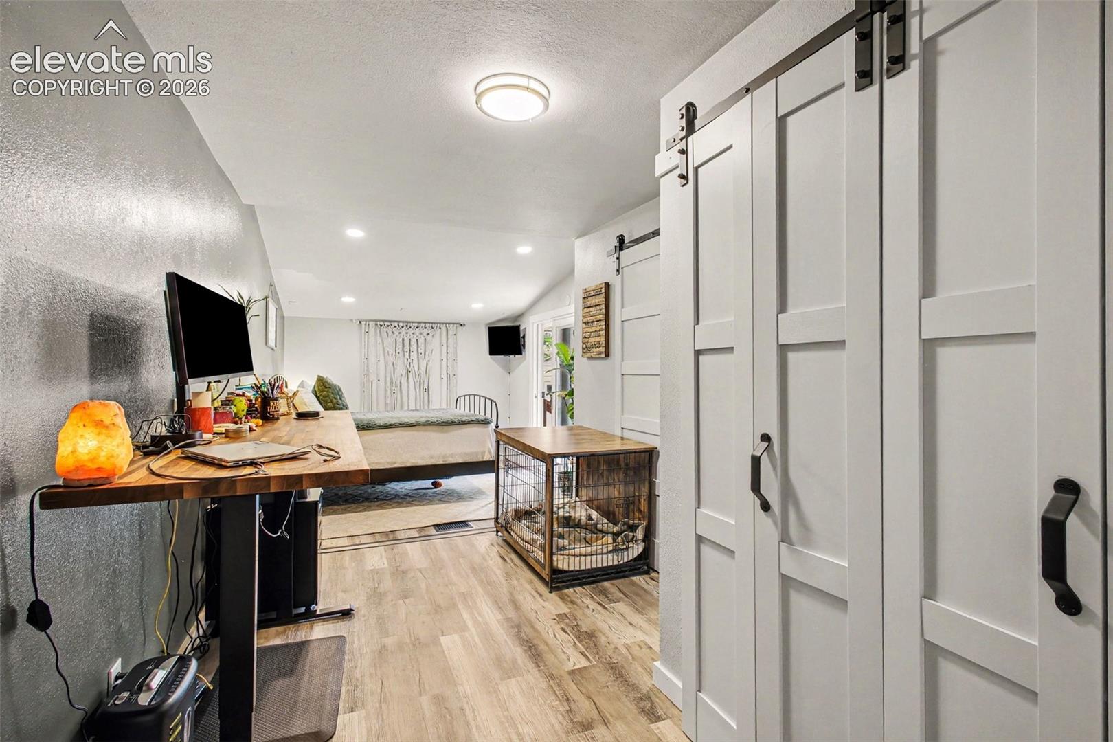Expanded master with barn doors
