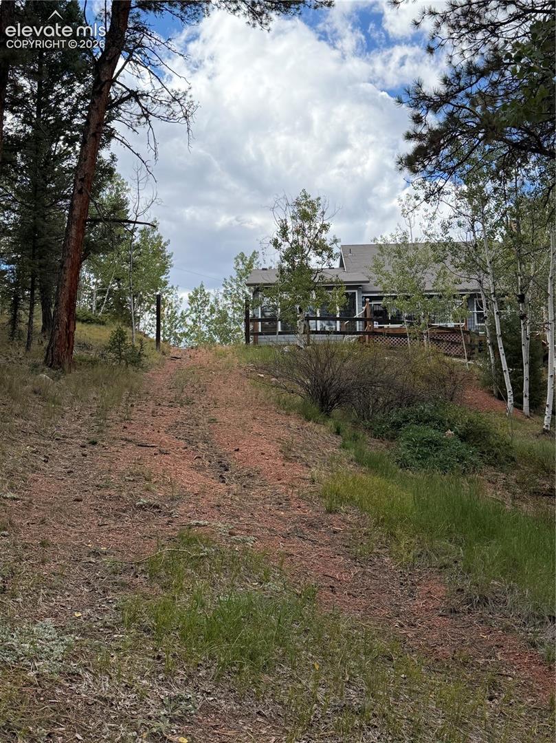 Additional driveway to main floor entry door.