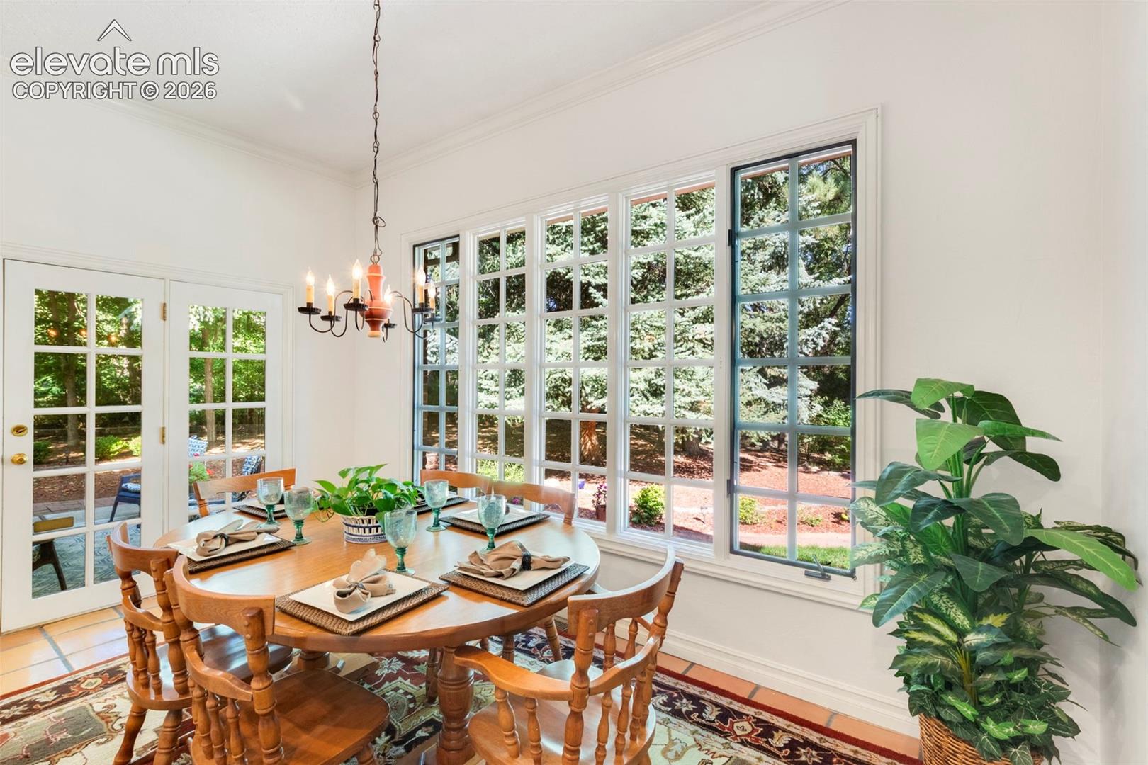 Kitchen casual dining area off kitchen with large windows and walkout
