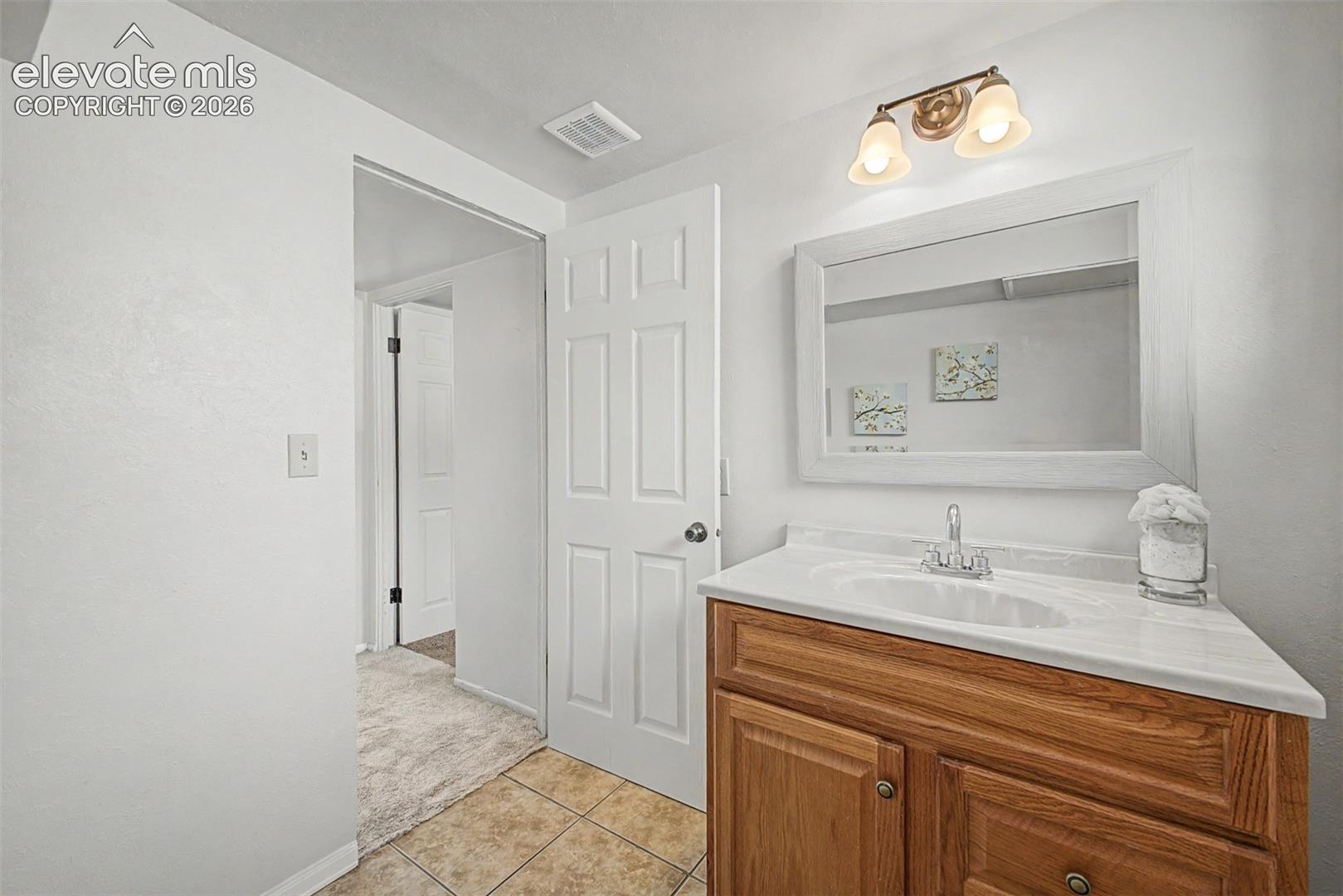 Lower level half bathroom has room to add a corner shower (previously had one) 