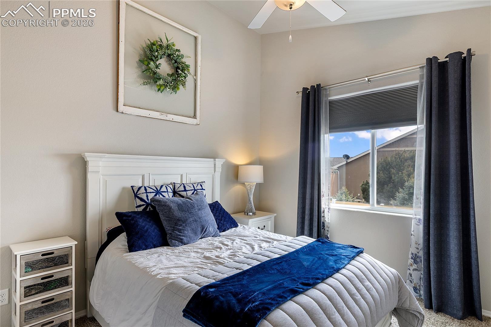 Bright secondary bedroom with an en suite bathroom