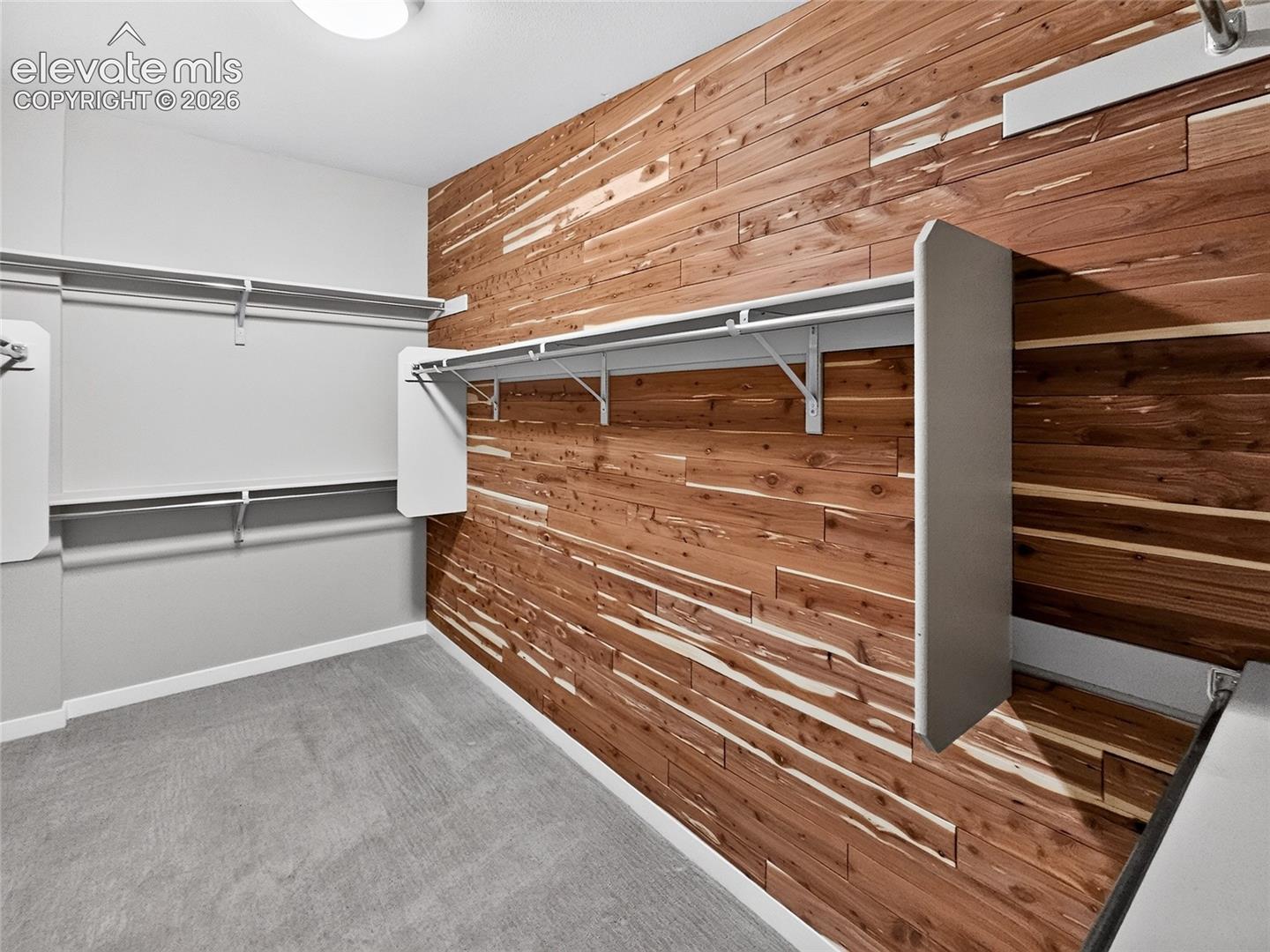 Custom cedar wall paneling creating a distinctive accent