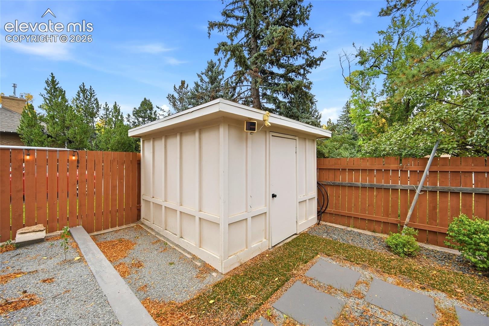 Hide your gardening tools in this backyard shed. 