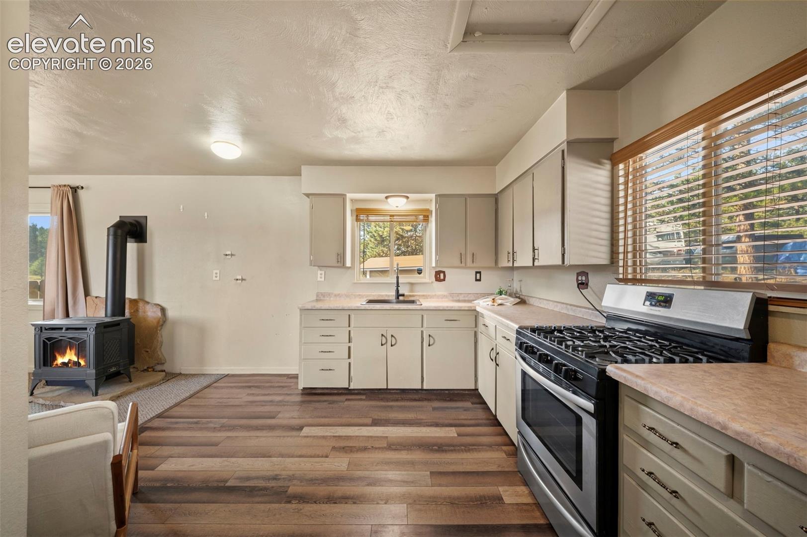 Kitchen with multiple windows to draw in the sunlight