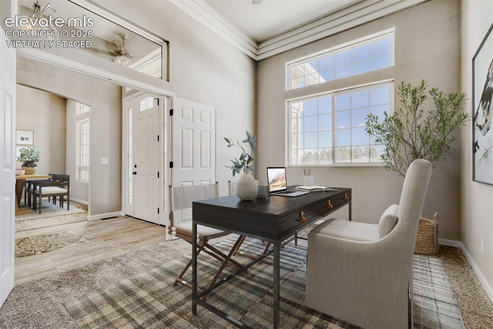 Virtually staged Secondary Bedroom #1 or Office off the front door with full bath.
