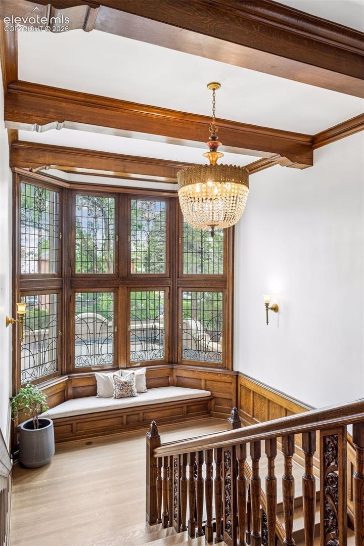 Bronze and crystal eight-light Art Deco chandelier was sourced from the historic Masonic Temple on St. Charles Avenue in downtown New Orleans.