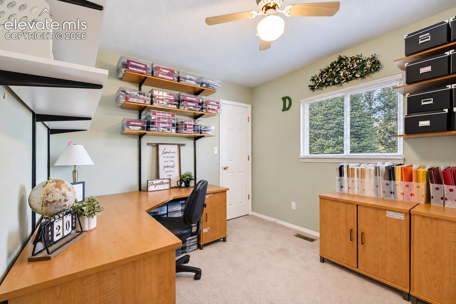 Upper Level Bedroom currently made in to a home office. It also has a walk in closet.