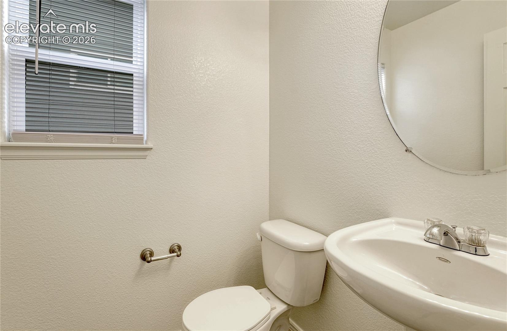Main level powder bathroom. 