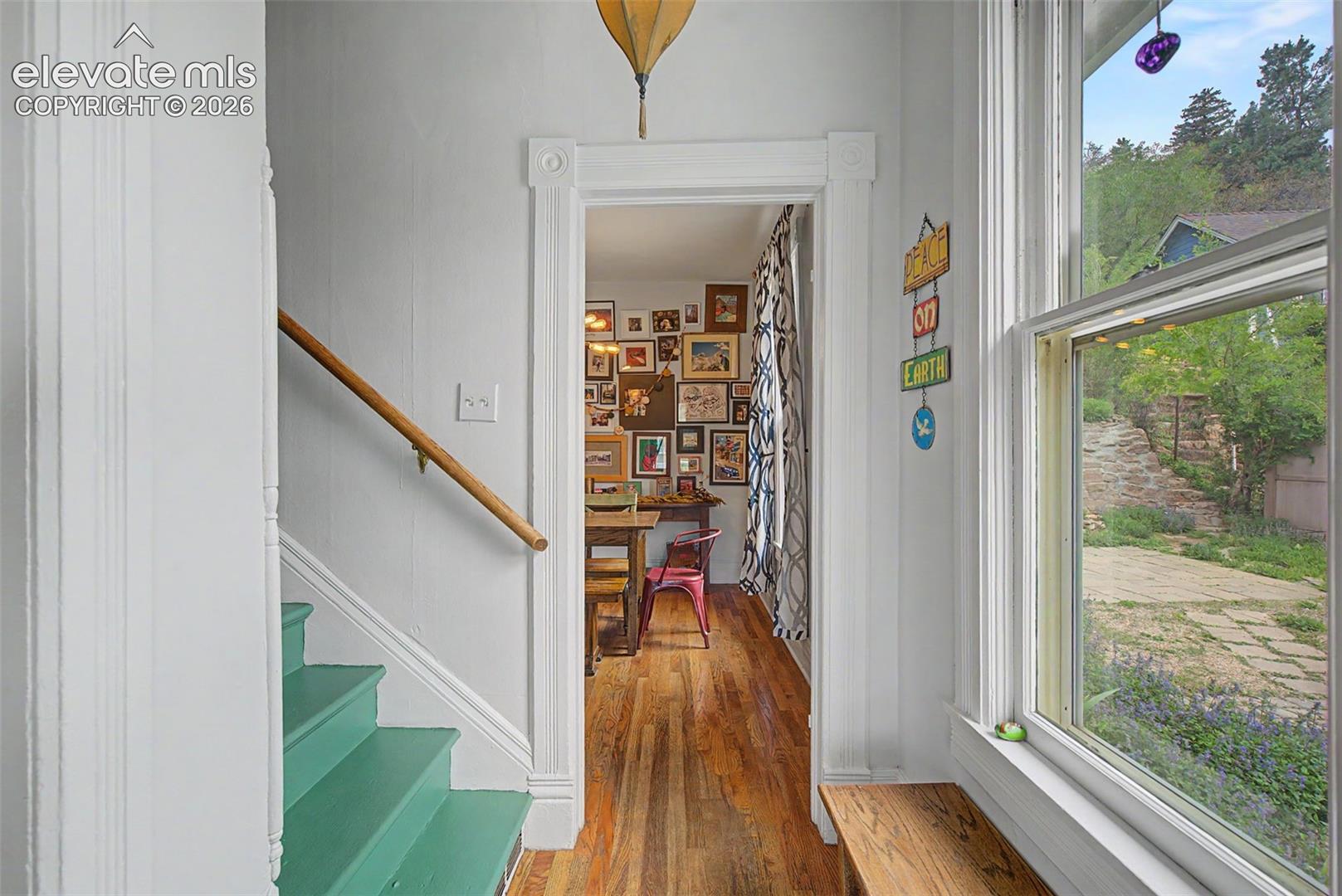 Entry way featuring hardwood flooring