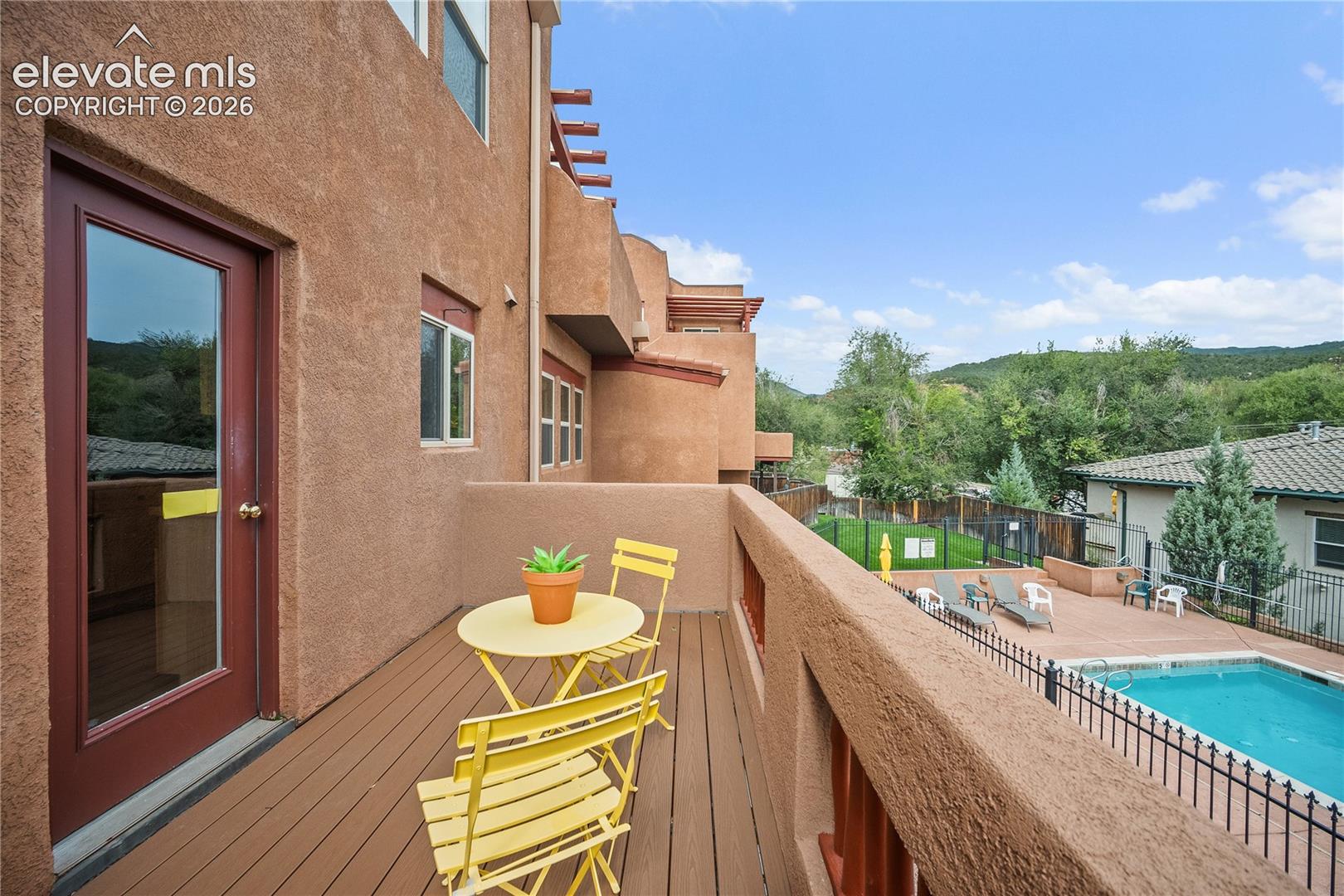 Balcony over looks the pool. 