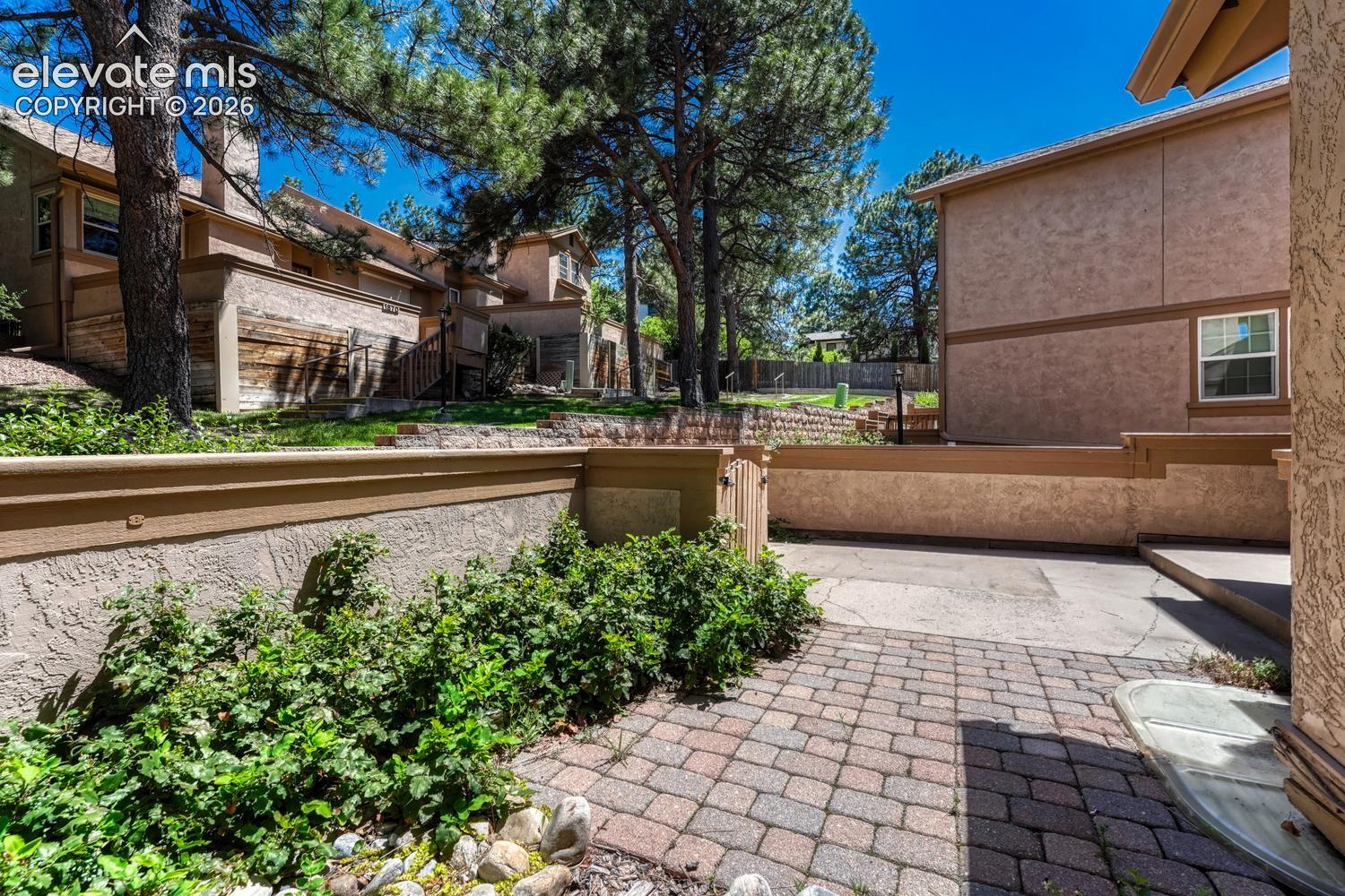 Paver patio in the front courtyard.