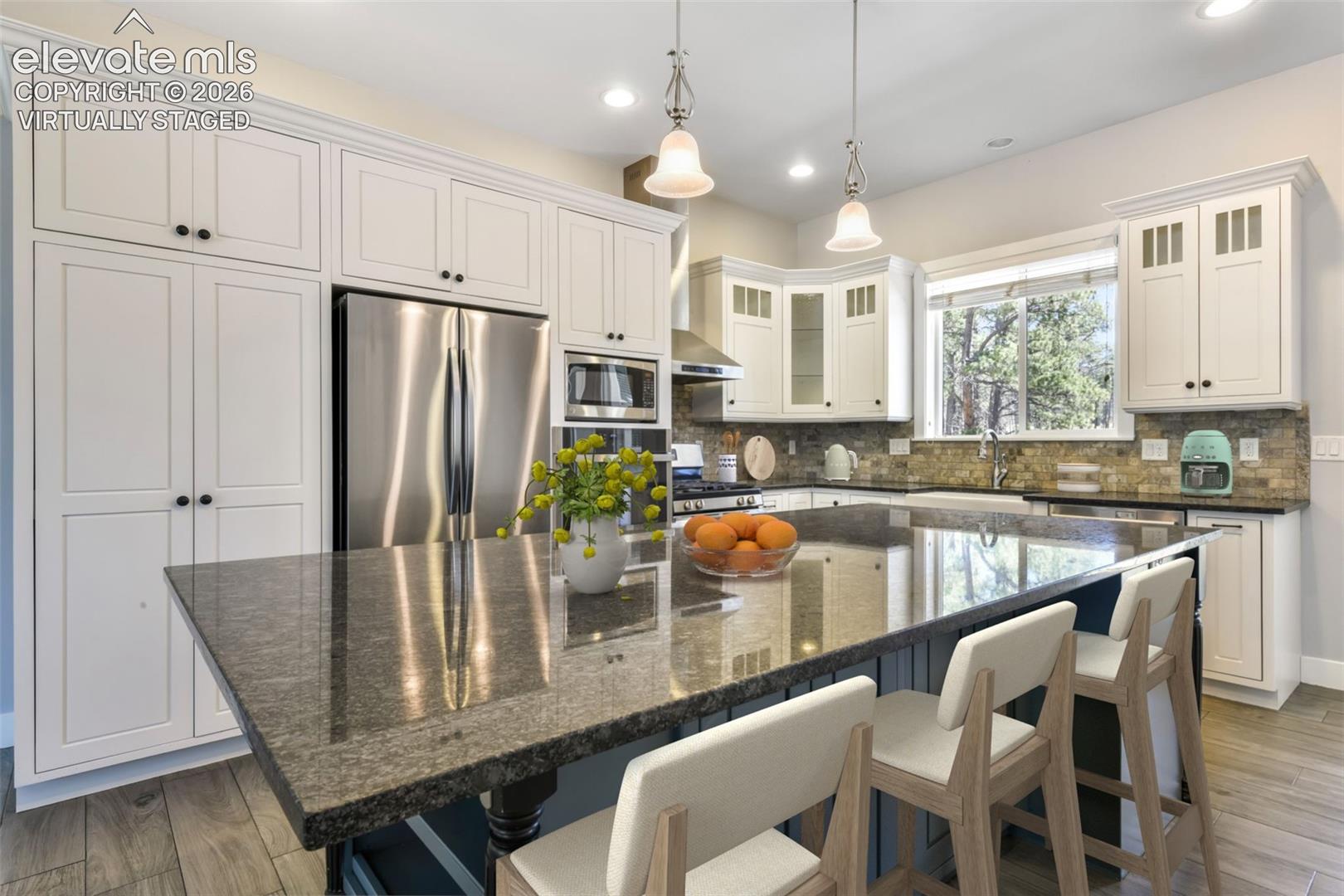 Incredible kitchen with island virtually staged