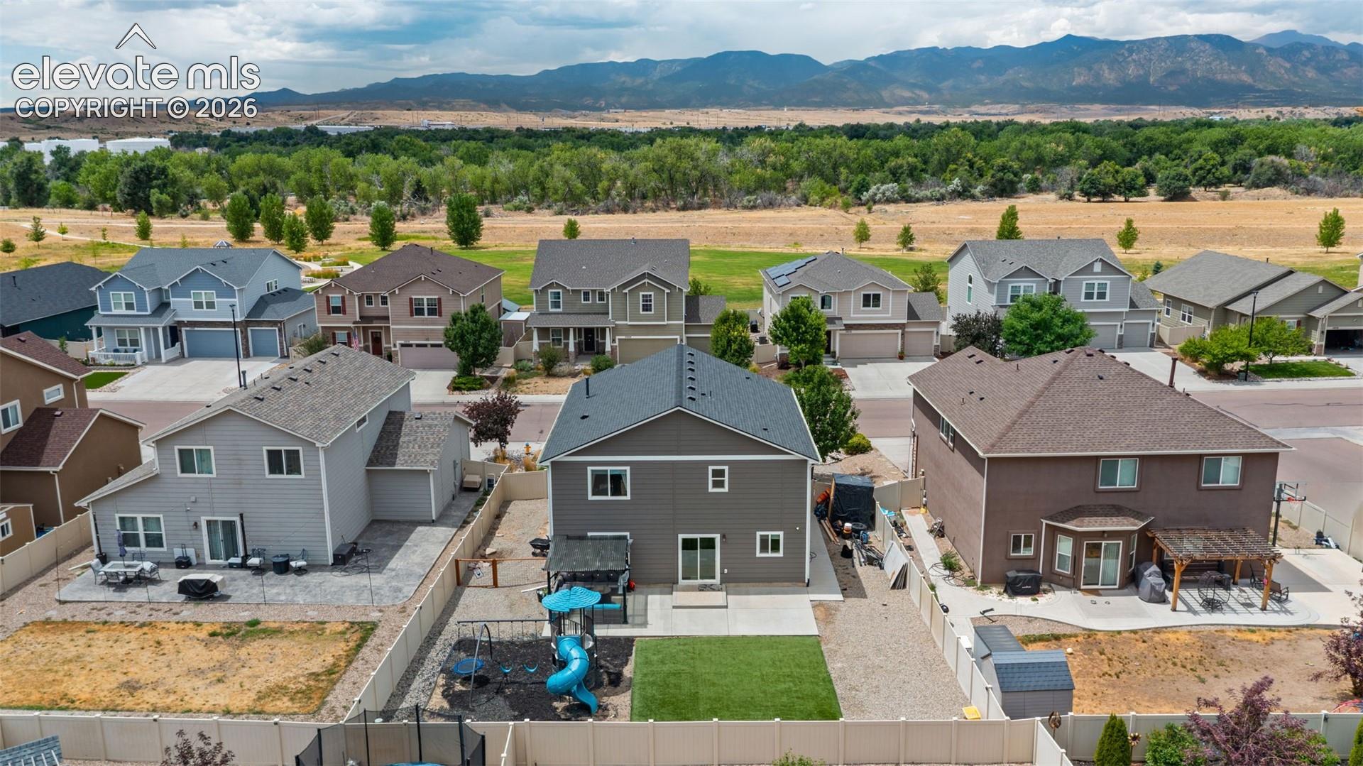 Contemporary residential neighborhood with mountain backdrop