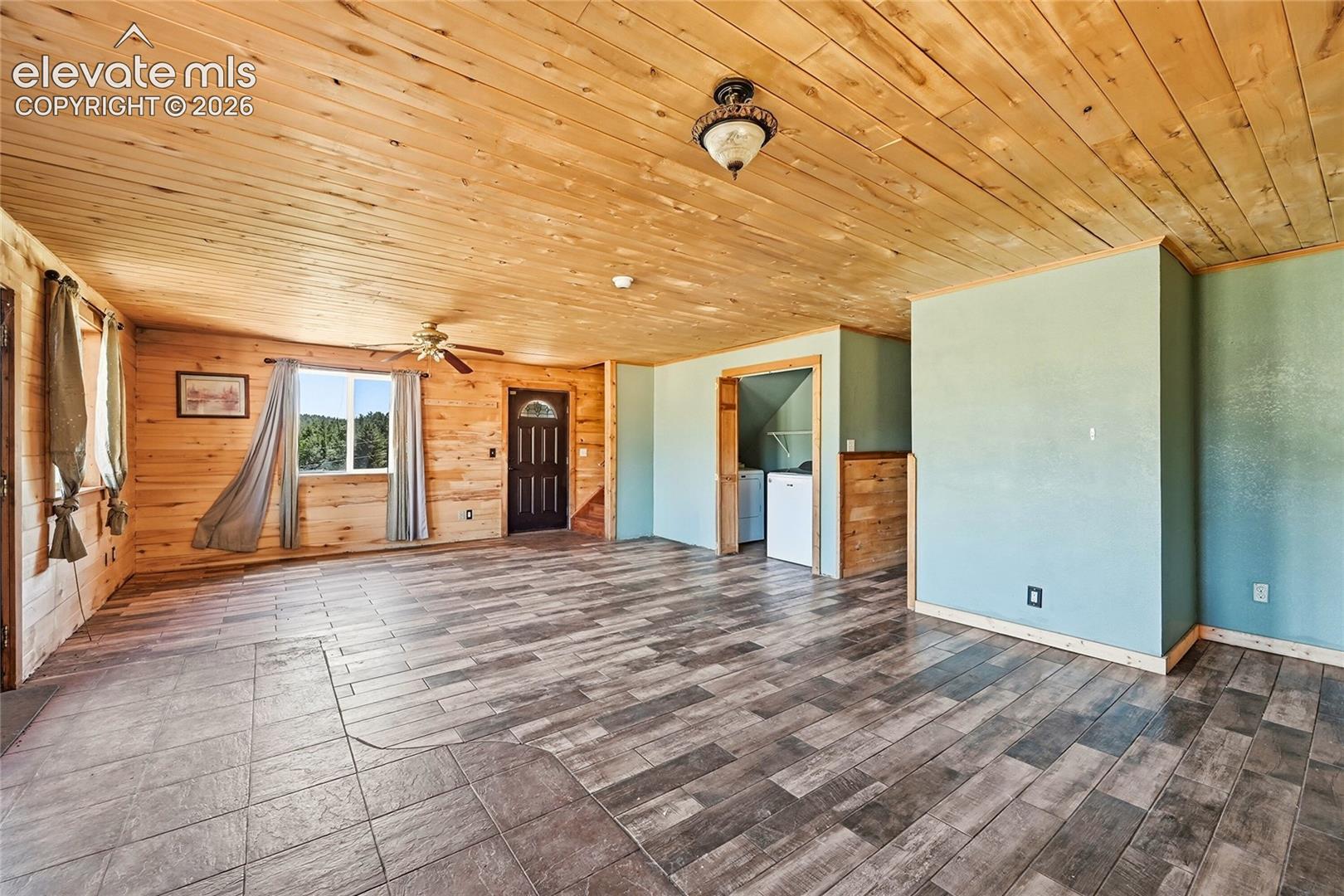 Wood-finish plank flooring throughout