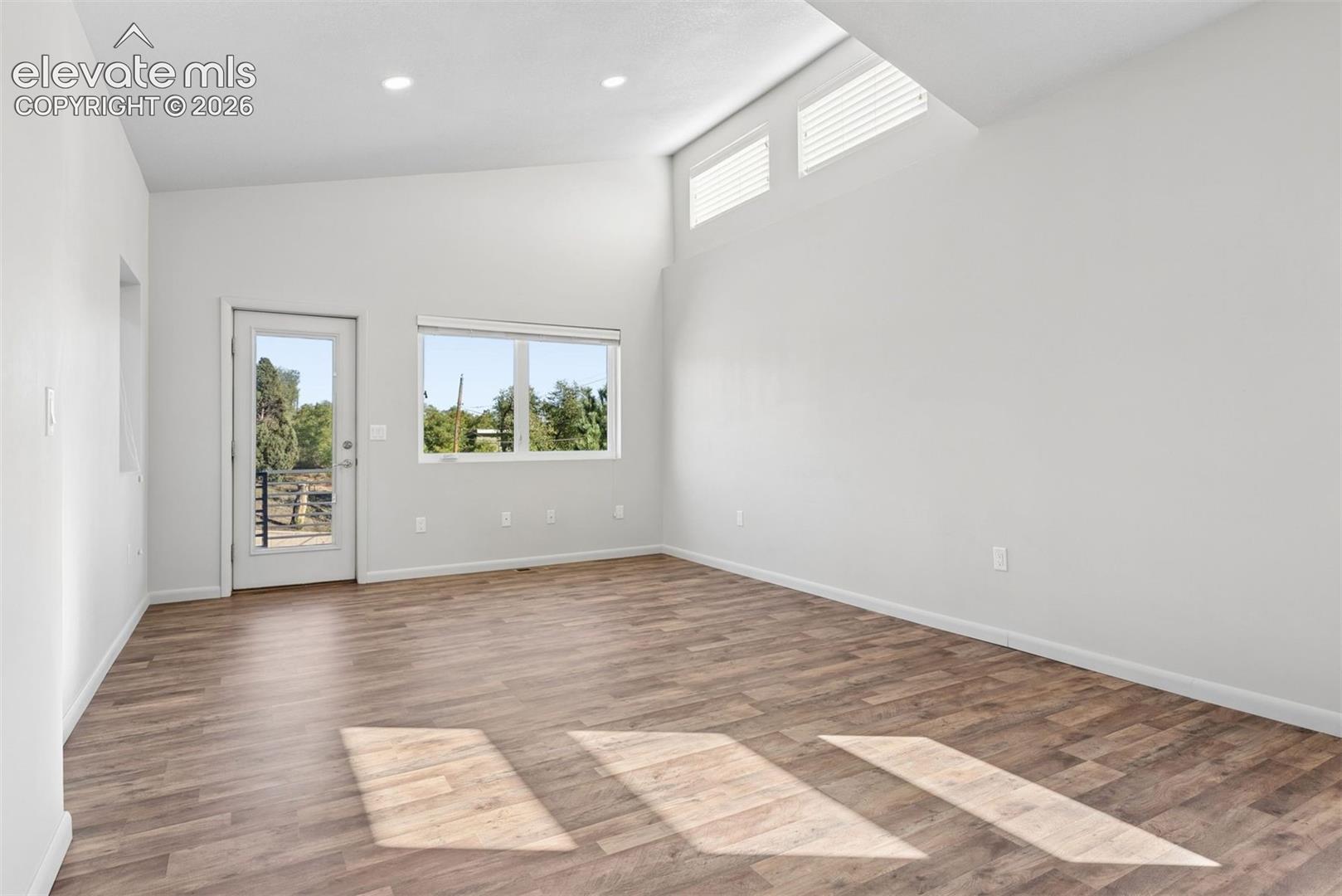 Dormers flood the room with natural light. 