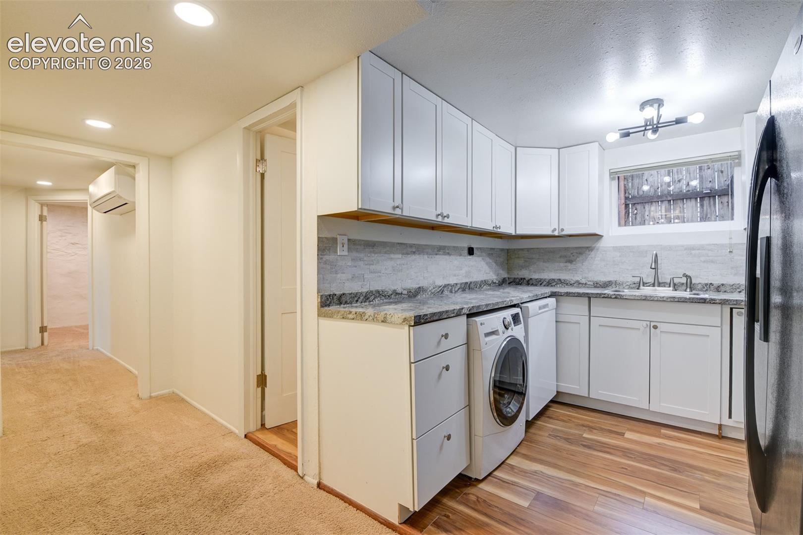 Basement unit located in the back of the property 