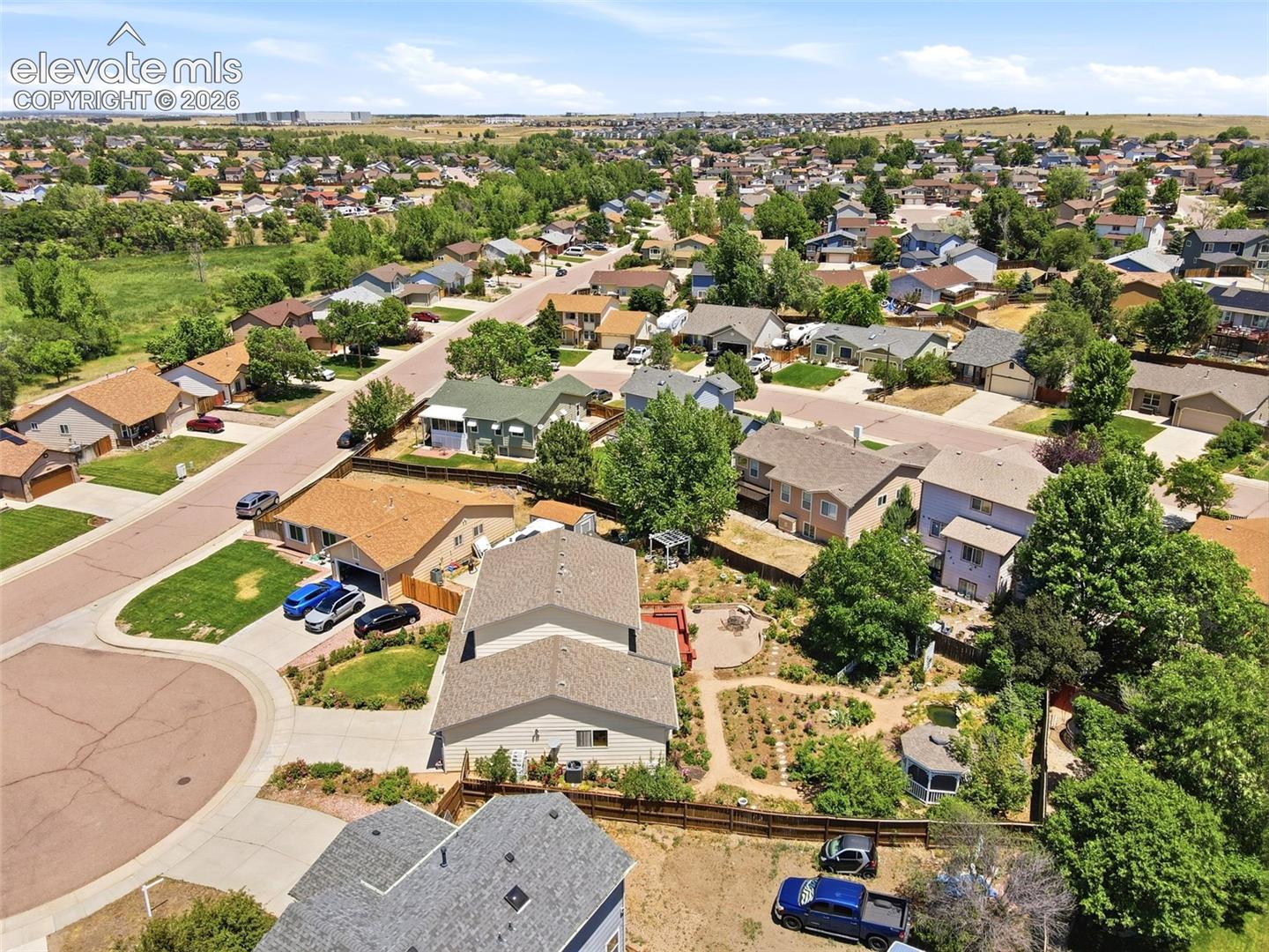 Aerial perspective showcasing a residential neighborhood with varied architectural styles