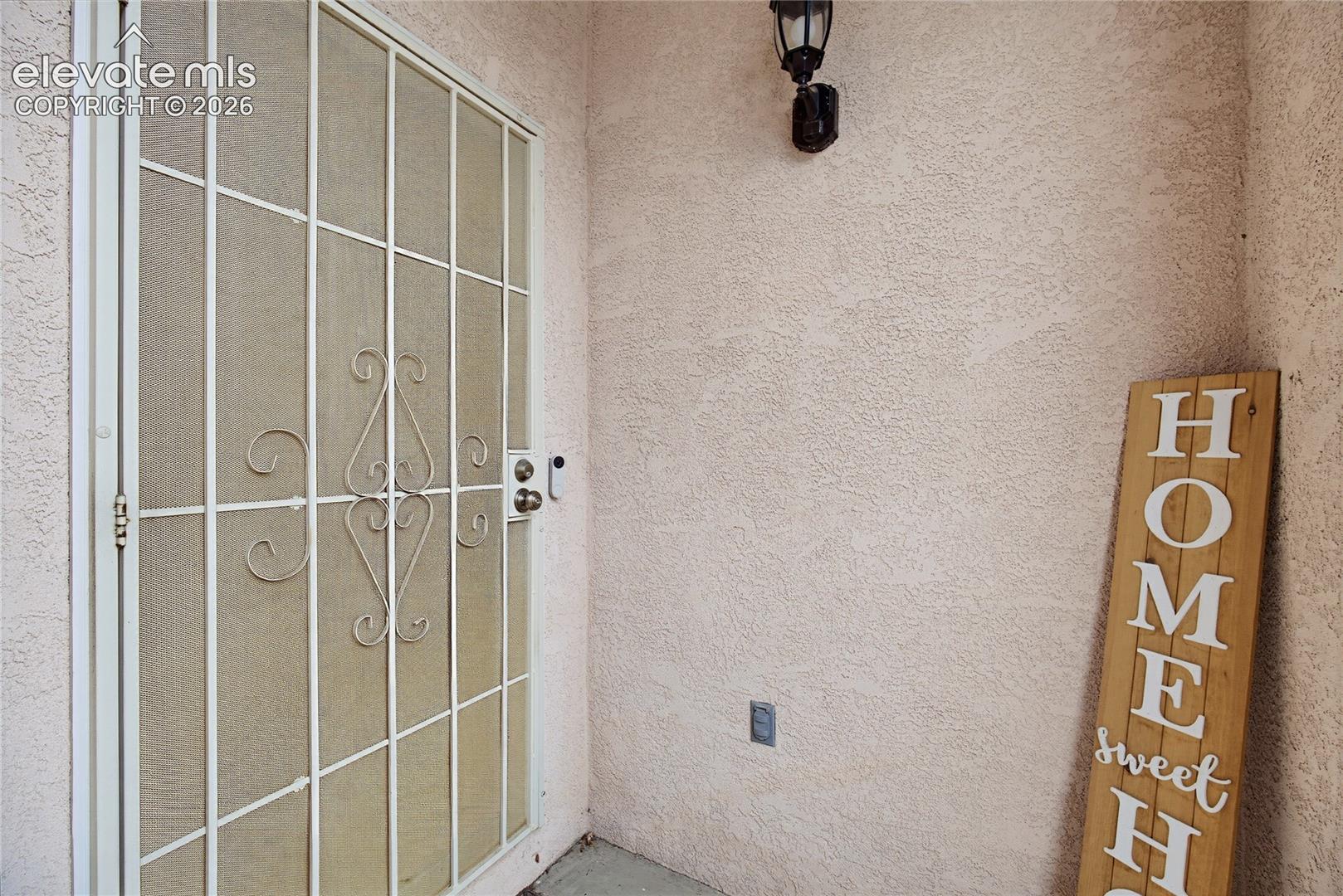 Decorative security screen door with integrated mesh