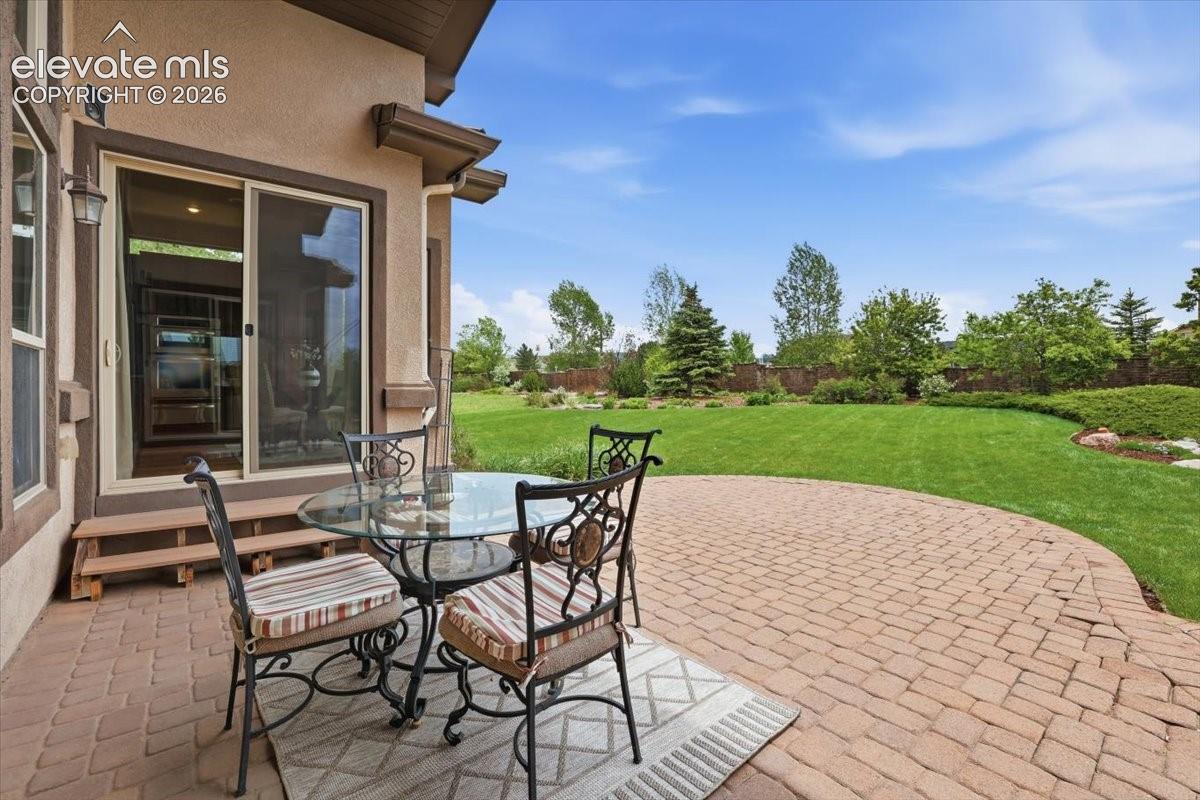 Paver patio with covering, speakers, and a natural gas line for grilling!
