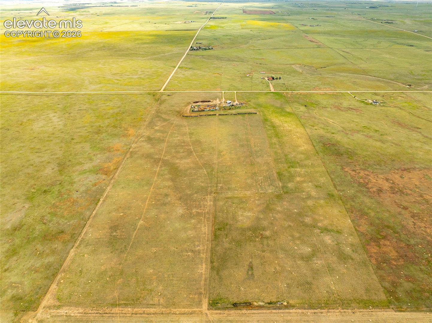 Expansive rural acreage featuring open pastureland, beautiful views and direct dirt road access