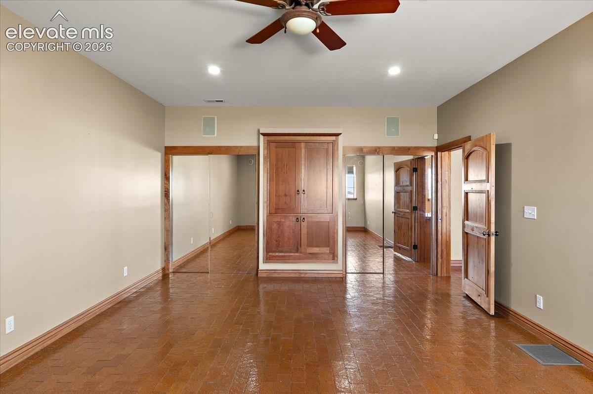 Closets and entertainment center in 2'nd bedroom