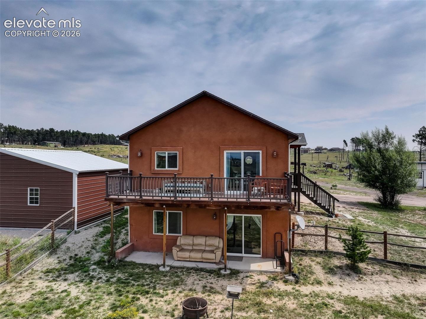 West facing full size deck and covered patio Walk out basement and patio on ground level.