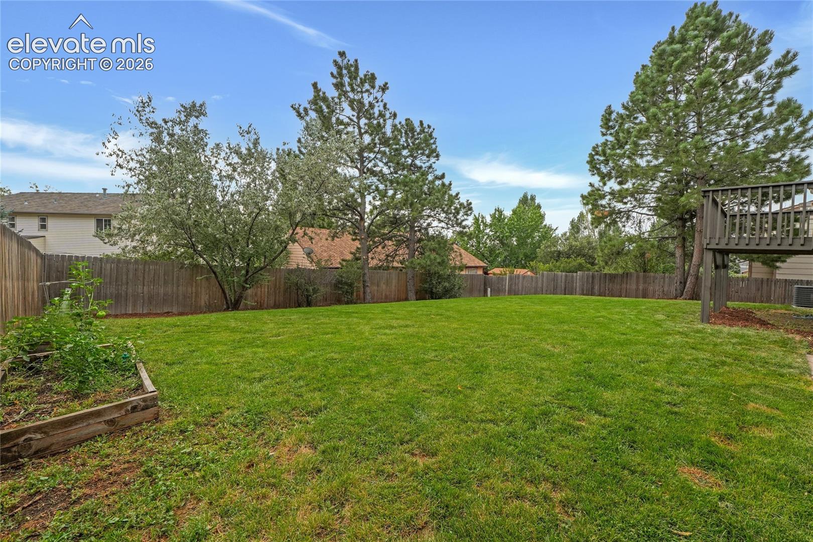 Refreshed fenced in backyard 
