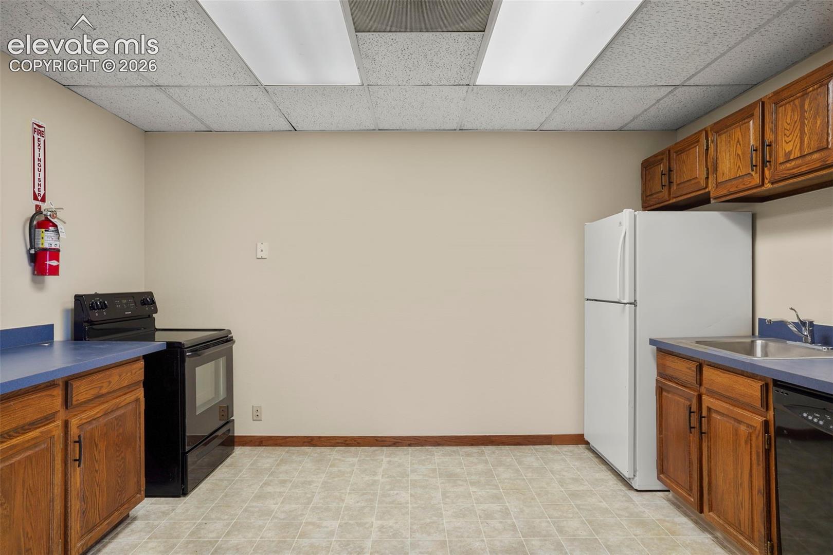 Upper Floor kitchen with refrigerator, range and dishwasher