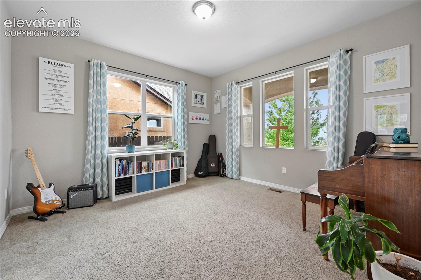 The front room or office just inside the front is great for piano lessons, home office, sitting room, or a toy room for the kids that is still within ear-shot of the main living areas.