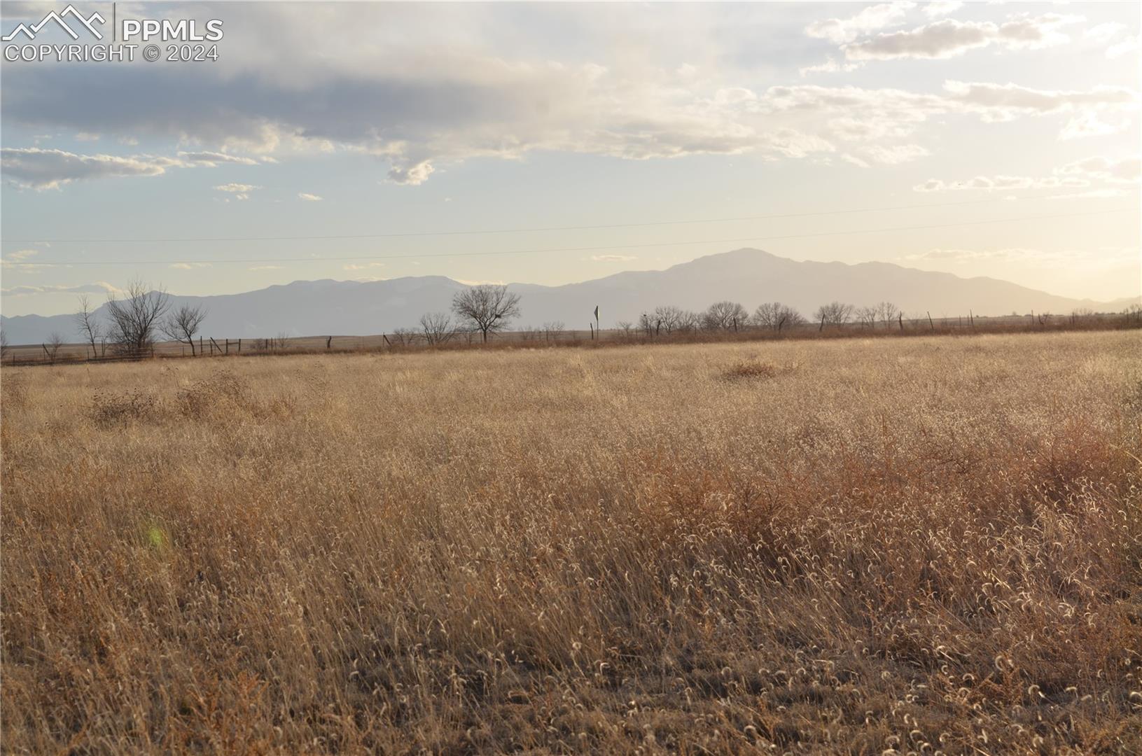 View of mountain feature with a rural view