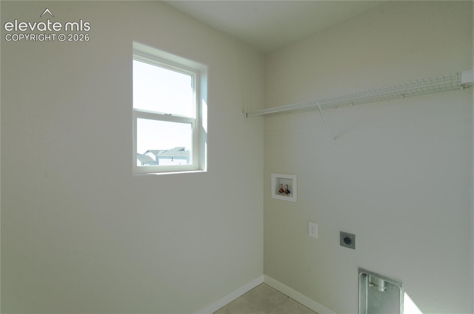 laundry room located upstairs