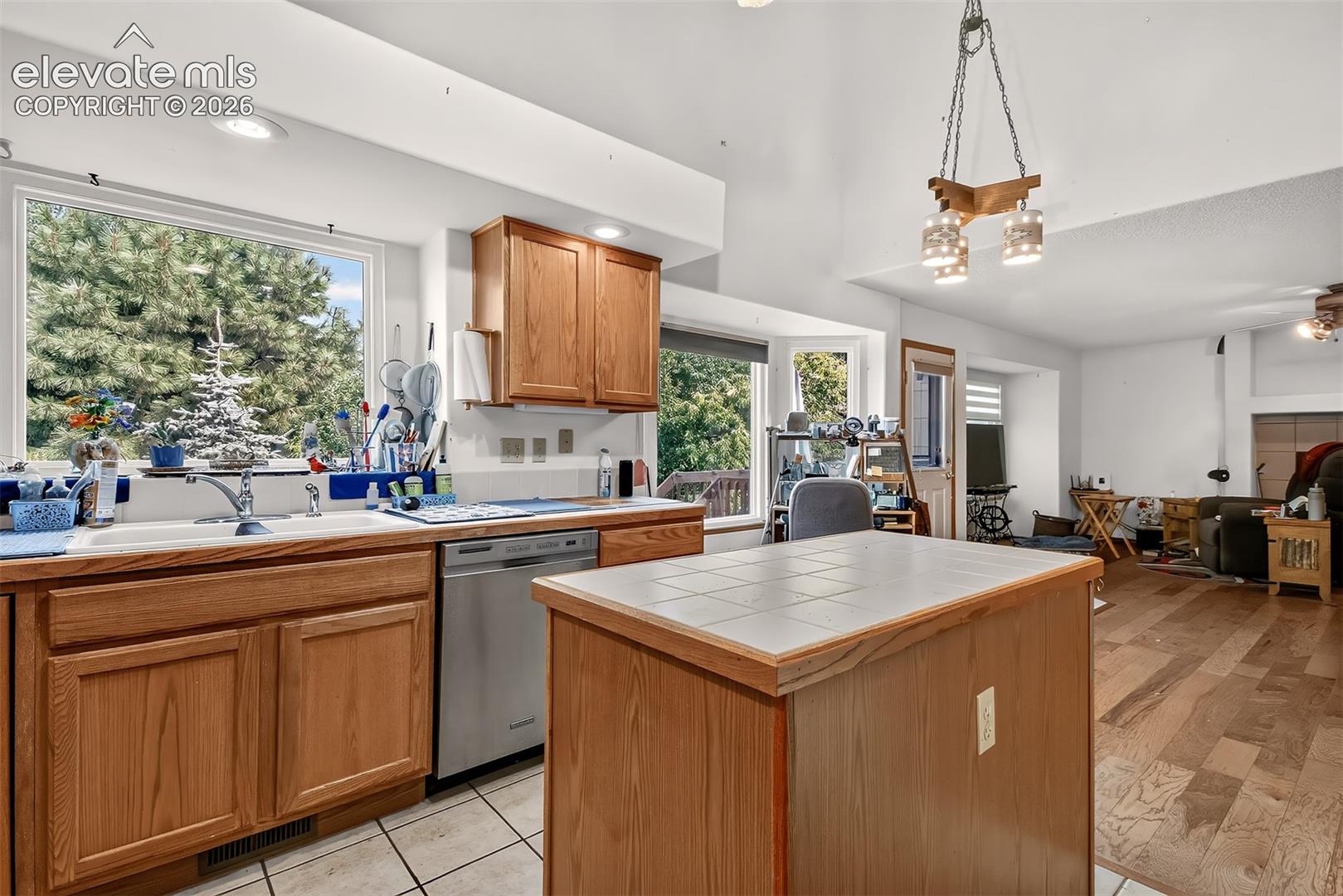 Tile Countertops and Ceramic Tile Floors in Kitchen 