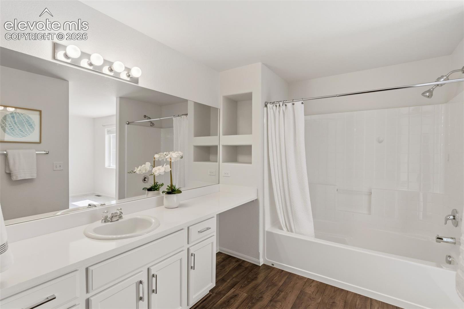 Soak your cares away in the private primary en-suite tub and shower combo