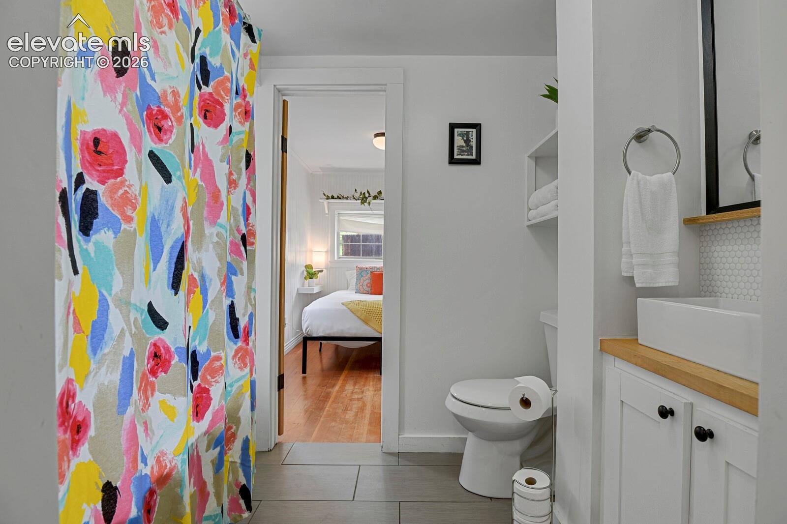 2nd bathroom with clawfoot tub and shower