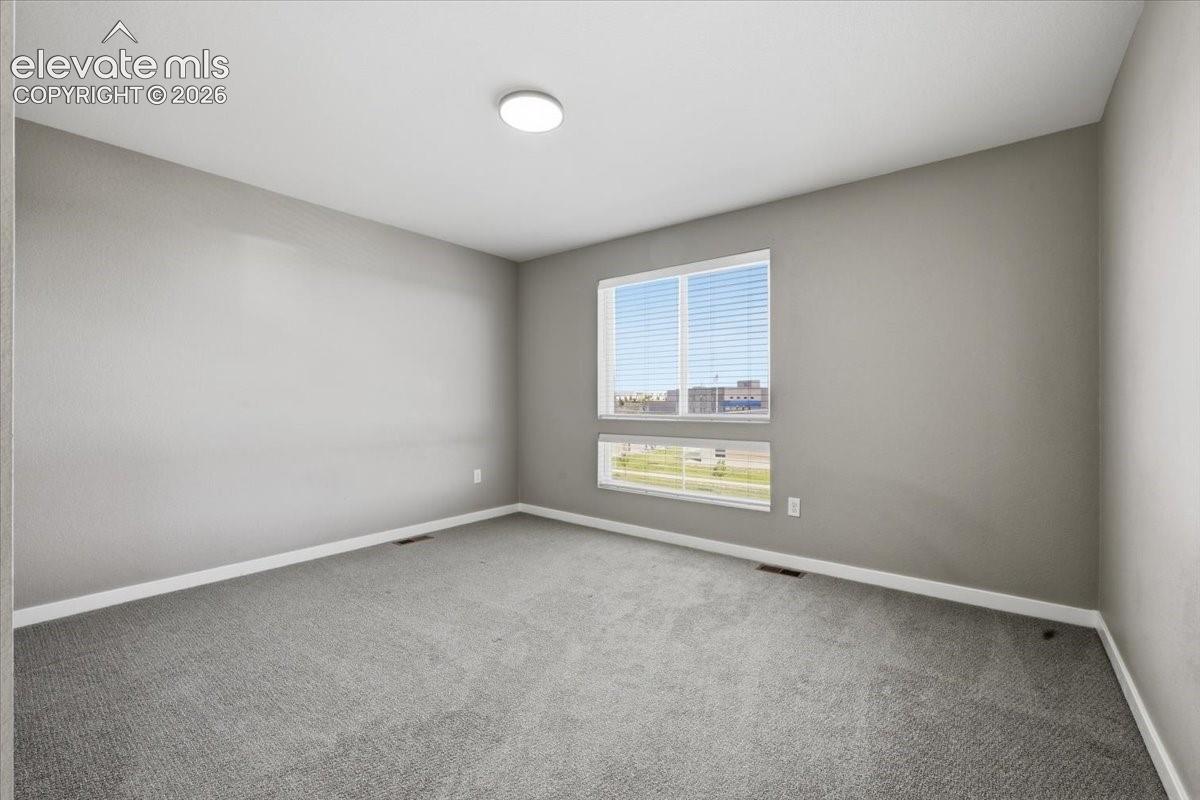 Large secondary upstairs bedroom with en suite bathroom and walk in closet