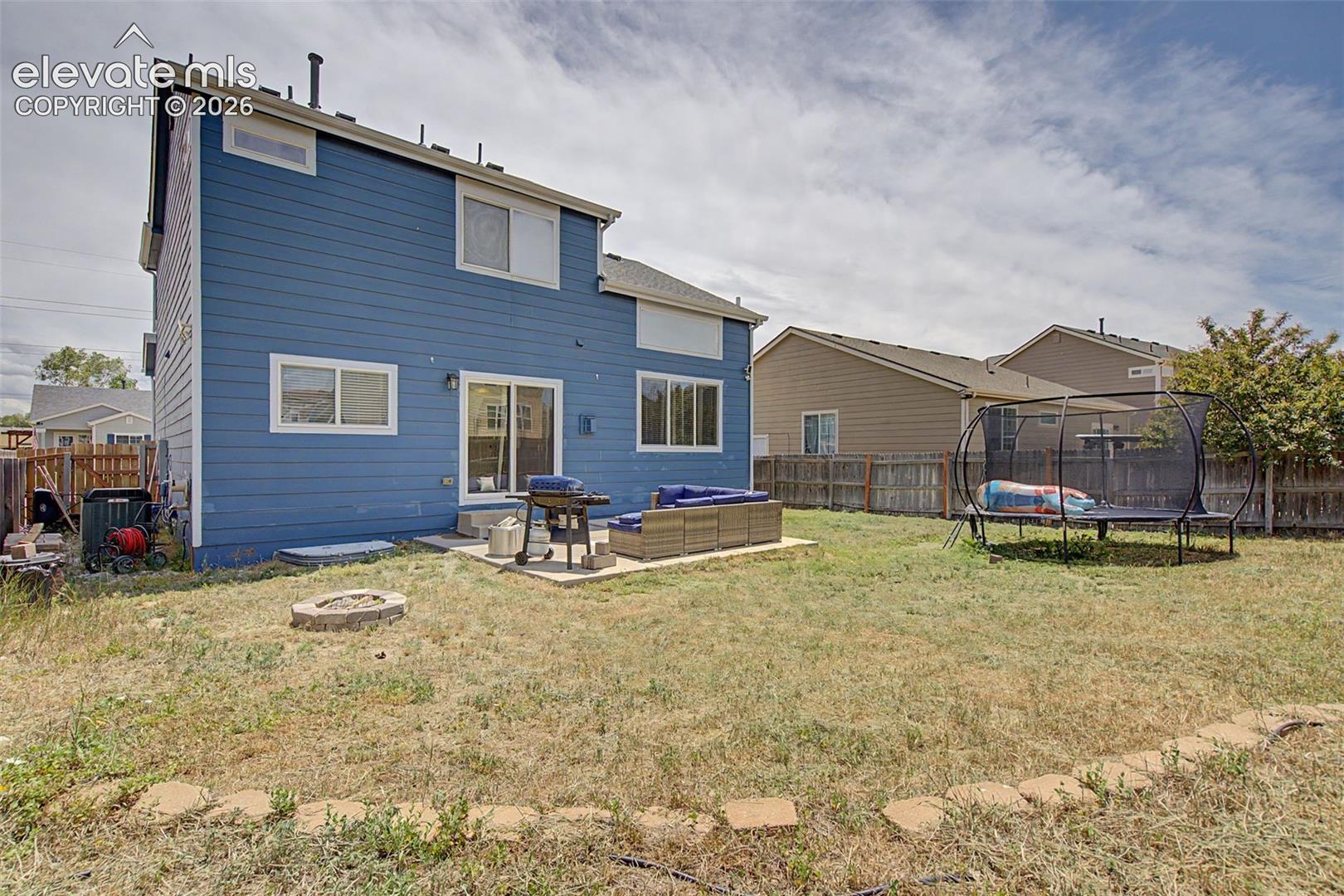 Fenced Backyard & Rear Exterior