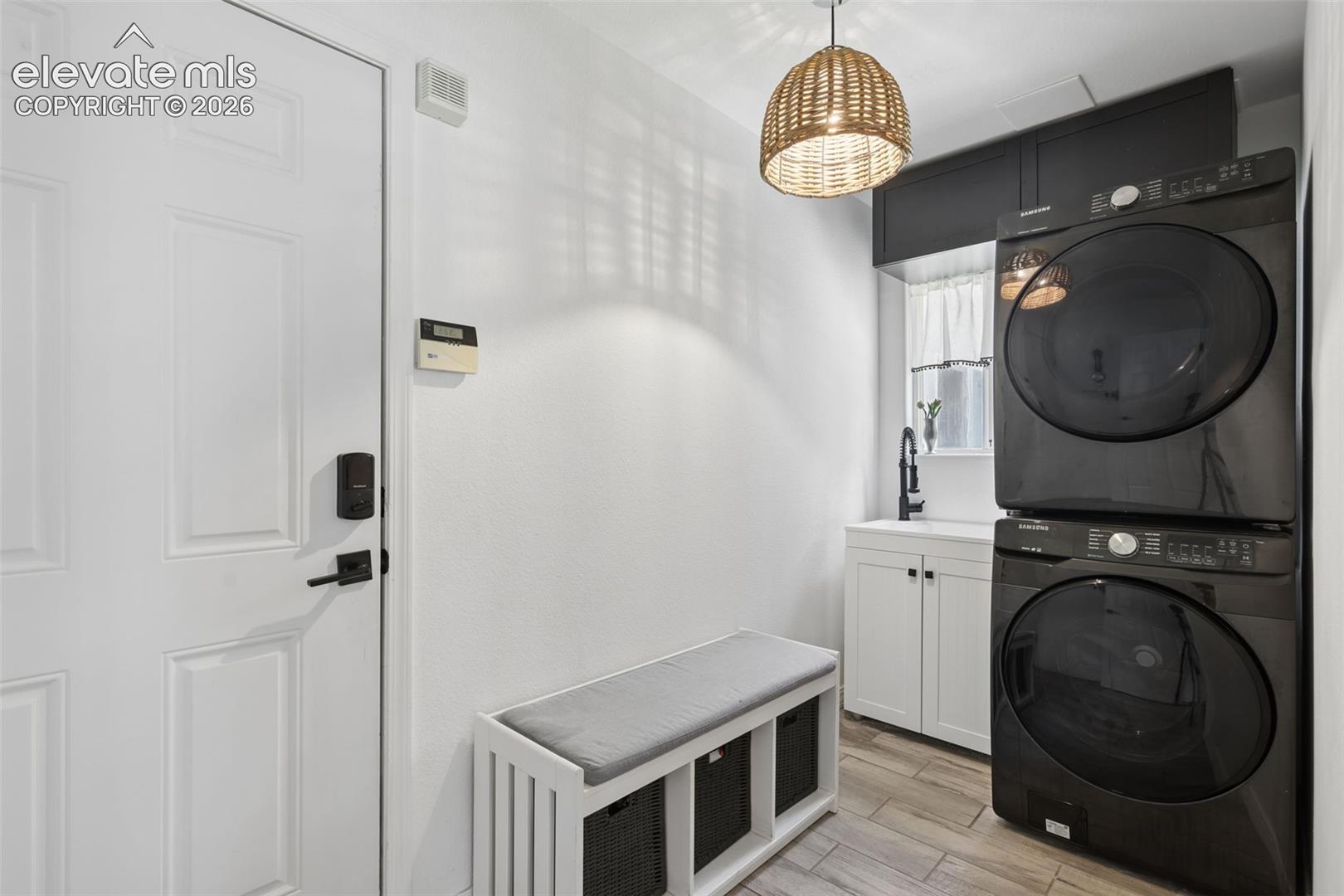 Laundry/mud-room and entry into 3 car garage