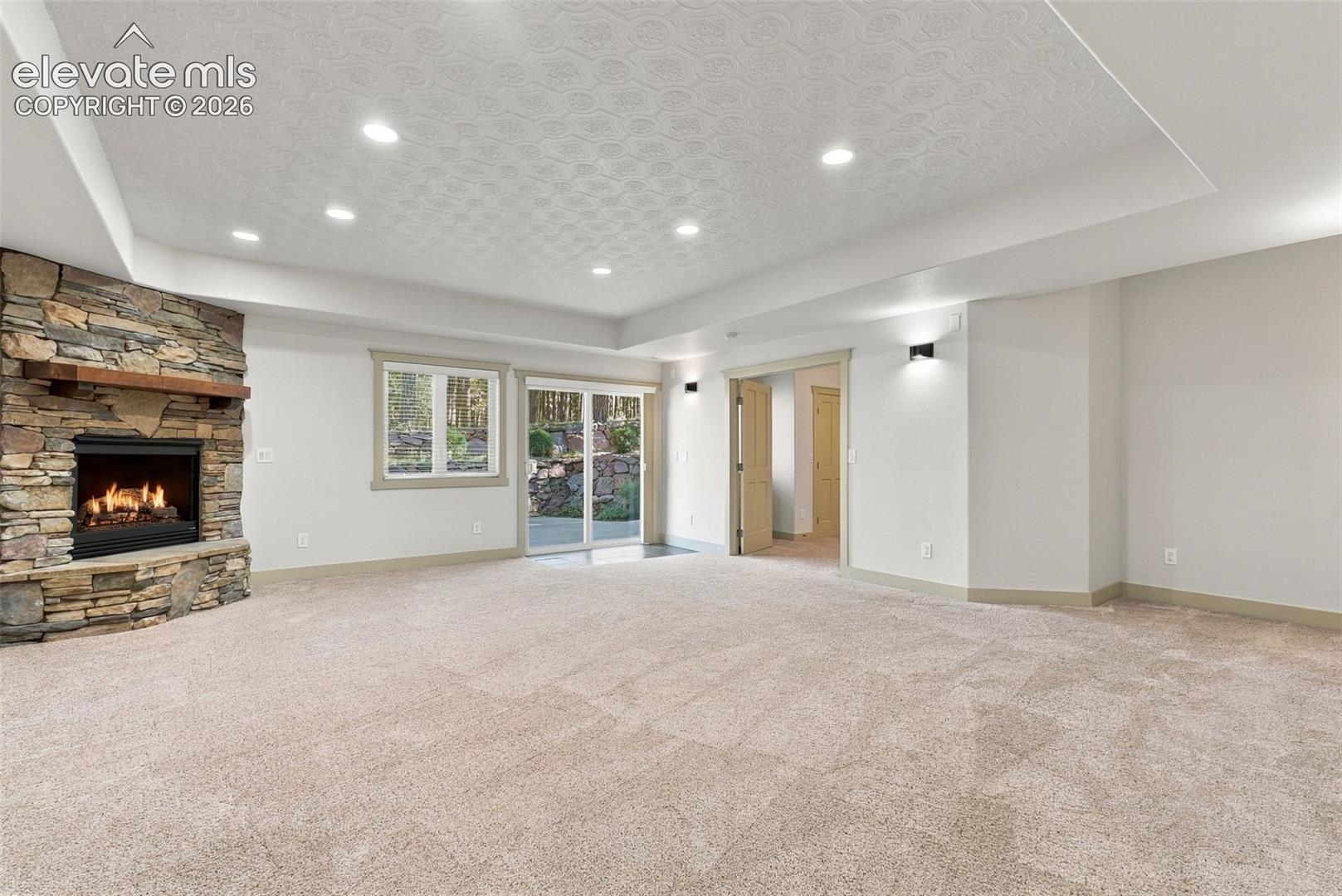 Fireplace in lower level recreation room